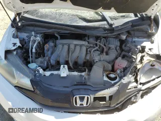 2016 Honda Fit LX z VIN JHMGK5H59GX027526, wystawiony jako Copart lot #57831785 z przebiegiem Nie podano mil oraz Szkoda całkowita • Salvage title. Historia ofert i sprzedaży dostępna na DreamBid. Obrazek 11.