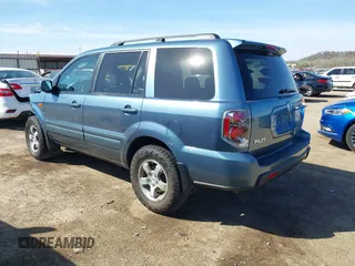 2007 Honda Pilot EX-L with VIN 5FNYF18517B028036, listed as a IAAI auction lot 41860675 with 61,217 mi miles and . Bid and sale history available at DreamBid. Image 3.