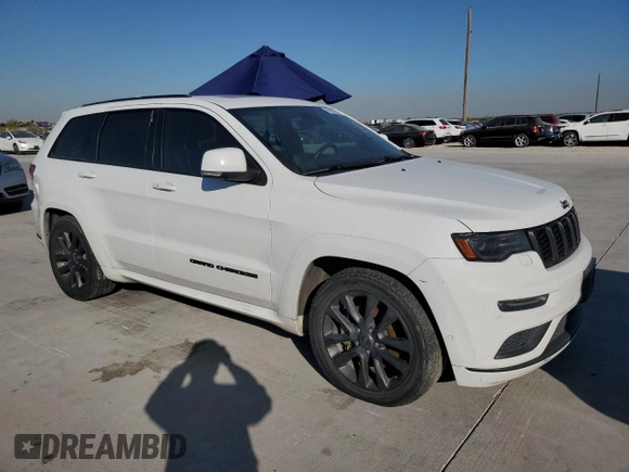2018 Jeep Grand Cherokee High Altitude with VIN 1C4RJFCM1JC390077, listed as a Copart auction lot 82932604 with 124,561 mi miles and Clean Title. Bid and sale history available at carsss.com. Image 4.