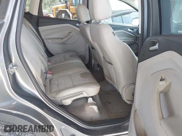 2014 Ford Escape SE z VIN 1FMCU0G97EUE34174, wystawiony jako IAAI lot #42274846 z przebiegiem 121 801 mil mil oraz . Historia ofert i sprzedaży dostępna na DreamBid. Obrazek 8.