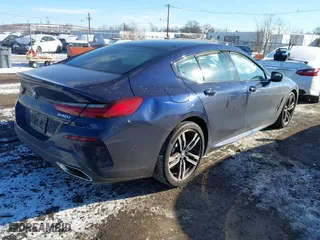 2020 BMW 8 Series 840i with VIN WBAGV4C01LCD97854, listed as a IAAI auction lot 41263040 with 66,935 mi miles. Bid and sale history available at carsss.com. Image 4.