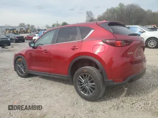 2021 Mazda CX-5 Touring with VIN JM3KFACM7M0334633, listed as a Copart auction lot 51618875 with 70,558 mi miles and Salvage Title. Bid and sale history available at DreamBid. Image 2.