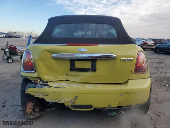 2009 MINI Cooper Convertible with VIN WMWMR33549TU95327, listed as a Copart auction lot 88493115 with 76,714 mi miles and Salvage Title. Bid and sale history available at carsss.com. Image 6.