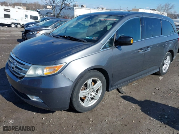 2013 Honda Odyssey Touring with VIN 5FNRL5H97DB018839, listed as a IAAI auction lot 41884016 with 171,650 mi miles. Bid and sale history available at carsss.com. Image 17.