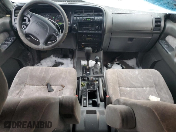 2000 Isuzu Trooper S with VIN JACDJ58X9Y7J18322, listed as a Copart auction lot 42444695 with 149,799 mi miles and Salvage title. Bid and sale history available at DreamBid. Image 8.