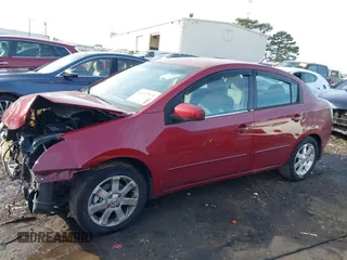 2007 Nissan Sentra 2.0 with VIN 3N1AB61E87L655566, listed as a IAAI auction lot 41327572 with 186,318 mi miles and . Bid and sale history available at DreamBid. Image 14.