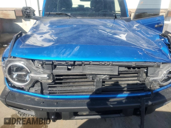 2023 Ford Bronco z VIN 1FMEE5BP9PLC15220, wystawiony jako Copart lot #41729435 z przebiegiem 10 855 mil mil oraz Szkoda całkowita • Salvage title. Historia ofert i sprzedaży dostępna na DreamBid. Obrazek 12.