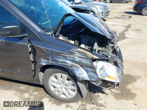 2020 Dodge Grand Caravan SE with VIN 2C4RDGBG9LR237367, listed as a IAAI auction lot 41869344 with 91,452 mi miles and . Bid and sale history available at DreamBid. Image 6.