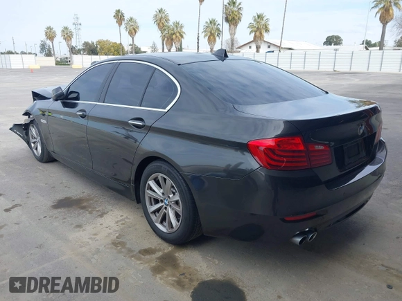 2014 BMW 5 Series 528i with VIN WBA5A5C52ED503033, listed as a IAAI auction lot 41562997 with 127,564 mi miles. Bid and sale history available at carsss.com. Image 3.