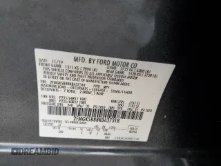 2019 Ford Flex SE z VIN 2FMGK5B88KBA37318, wystawiony jako Copart lot #57229405 z przebiegiem 34 109 mil mil oraz Szkoda całkowita • Salvage title. Historia ofert i sprzedaży dostępna na DreamBid. Obrazek 13.