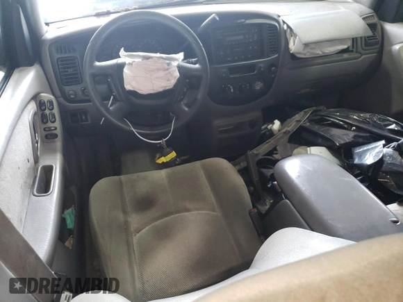 2001 Mazda Tribute LX with VIN 4F2CU08141KM65160, listed as a Copart auction lot 60895624 with 255,194 mi miles and Salvage Title. Bid and sale history available at DreamBid. Image 8.