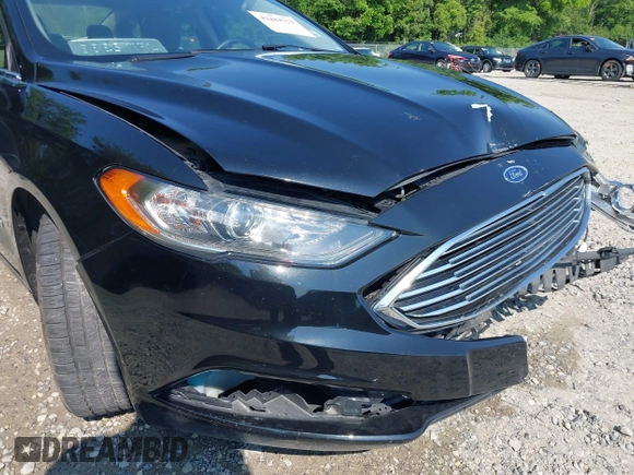 2017 Ford Fusion Hybrid SE with VIN 3FA6P0LU5HR344879, listed as a IAAI auction lot 42483771 with 146,603 mi miles and . Bid and sale history available at DreamBid. Image 18.