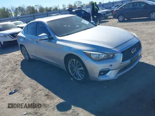 2019 Infiniti Q50 Luxe z VIN JN1EV7AR5KM551200, wystawiony jako IAAI lot #40855105 z przebiegiem 97 710 mil mil oraz . Historia ofert i sprzedaży dostępna na DreamBid. Obrazek 1.