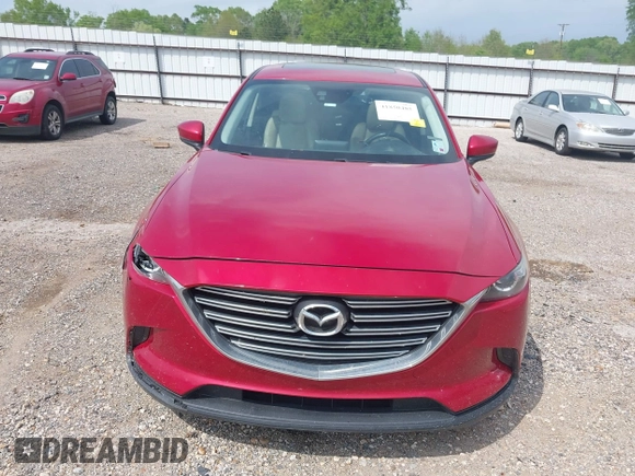 2016 Mazda CX-9 Touring z VIN JM3TCACY0G0101617, wystawiony jako IAAI lot #41850485 z przebiegiem 292 880 mil mil oraz . Historia ofert i sprzedaży dostępna na DreamBid. Obrazek 13.
