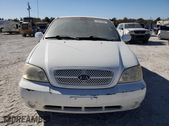 2004 Kia Sedona LX with VIN KNDUP131046585706, listed as a Copart auction lot 74973304 with 107,130 mi miles and Salvage Title. Bid and sale history available at carsss.com. Image 5.