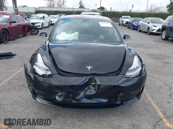 2018 Tesla Model 3 Long Range Battery with VIN 5YJ3E1EA9JF009384, listed as a IAAI auction lot 41544624 with 66,896 mi miles and . Bid and sale history available at DreamBid. Image 12.