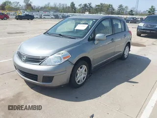 2011 Nissan Versa 1.8 S with VIN 3N1BC1CP0BL434989, listed as a IAAI auction lot 42112607 with 141,996 mi miles. Bid and sale history available at carsss.com. Image 2.