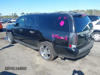 2007 Chevrolet Suburban LTZ with VIN 3GNFC16047G246612, listed as a IAAI auction lot 41802259 with Not Provided miles and . Bid and sale history available at DreamBid. Image 3.
