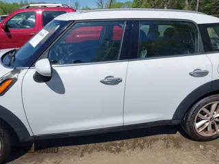 2013 MINI Countryman with VIN WMWZB3C56DWR36117, listed as a IAAI auction lot 42076676 with 168,750 mi miles and . Bid and sale history available at DreamBid. Image 14.
