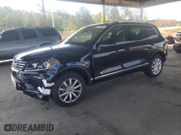 2017 Volkswagen Touareg Sport with VIN WVGEF7BP8HD000237, listed as a Copart auction lot 52714074 with 107,463 mi miles and . Bid and sale history available at DreamBid. Image 1.