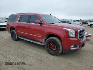 2015 GMC Yukon XL SLT with VIN 1GKS1HKC0FR113662, listed as a Copart auction lot 42992245 with 186,904 mi miles and Salvage Title. Bid and sale history available at carsss.com. Image 4.