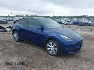 2023 Tesla Model Y Long Range z VIN 7SAYGDEE0PF840787, wystawiony jako IAAI lot #42172489 z przebiegiem 16 314 mil mil oraz . Historia ofert i sprzedaży dostępna na DreamBid. Obrazek 1.