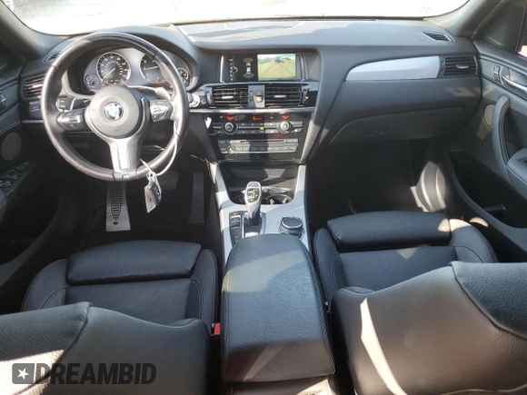 2018 BMW X4 M40i with VIN 5UXXW7C54J0Z44932, listed as a Copart auction lot 55973605 with 101,479 mi miles and Salvage title. Bid and sale history available at DreamBid. Image 8.