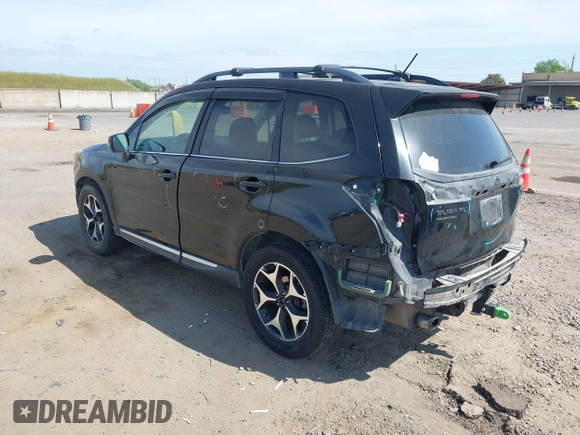 2015 Subaru Forester XT Touring with VIN JF2SJGUC5FH822632, listed as a IAAI auction lot 42032965 with 118,111 mi miles and . Bid and sale history available at DreamBid. Image 3.