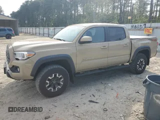 2020 Toyota Tacoma SR5 z VIN 3TMCZ5AN5LM338926, wystawiony jako Copart lot #55236145 z przebiegiem 67 409 mil mil oraz Szkoda całkowita • Salvage title. Historia ofert i sprzedaży dostępna na DreamBid. Obrazek 1.