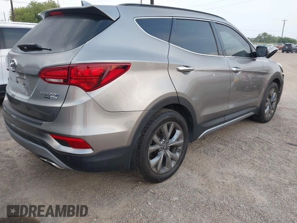 2018 Hyundai Santa Fe Ultimate with VIN 5NMZWDLAXJH100108, listed as a IAAI auction lot 42126768 with 68,325 mi miles and . Bid and sale history available at DreamBid. Image 4.
