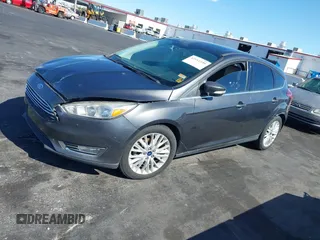 2017 Ford Focus Titanium with VIN 1FADP3N25HL299817, listed as a IAAI auction lot 42161440 with 154,974 mi miles and . Bid and sale history available at carsss.com. Image 14.