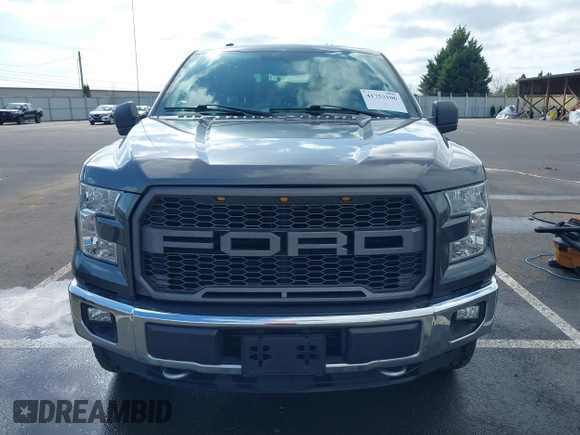 2015 Ford F-150 XLT with VIN 1FTEW1EG1FKE89277, listed as a IAAI auction lot 41752106 with 142,069 mi miles. Bid and sale history available at carsss.com. Image 12.