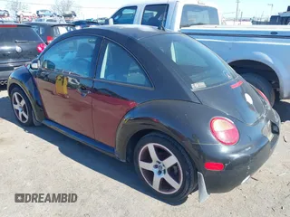 2005 Volkswagen New Beetle Coupe GLS with VIN 3VWCK31C45M404762, listed as a IAAI auction lot 41428782 with 135,706 mi miles. Bid and sale history available at carsss.com. Image 3.