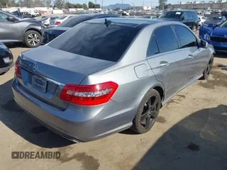 2011 Mercedes-Benz E-Class E 350 Luxury with VIN WDDHF5GB0BA371703, listed as a IAAI auction lot 42009783 with 161,771 mi miles. Bid and sale history available at carsss.com. Image 4.