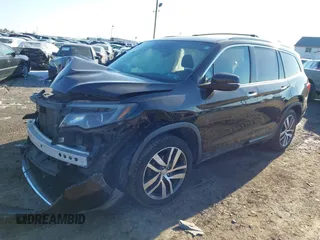 2016 Honda Pilot Elite with VIN 5FNYF6H01GB050524, listed as a IAAI auction lot 41452563 with 140,326 mi miles. Bid and sale history available at carsss.com. Image 17.