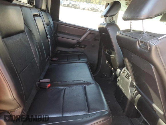 2013 Nissan Titan SL with VIN 1N6BA0ED7DN312114, listed as a Copart auction lot 77144014 with 120,656 mi miles and Salvage Title. Bid and sale history available at carsss.com. Image 10.