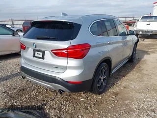 2019 BMW X1 sDrive28i with VIN WBXHU7C52K3H44360, listed as a IAAI auction lot 41709431 with 56,432 mi miles. Bid and sale history available at carsss.com. Image 4.