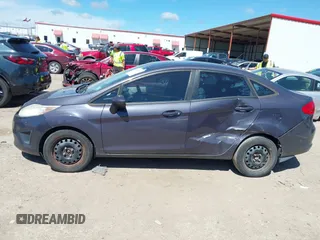 2013 Ford Fiesta S с VIN 3FADP4AJ7DM207683, выставлен на аукционе IAAI как лот 42220602 с пробегом 129 549 миль миль и . История ставок и продаж доступна на DreamBid. Изображение 14.