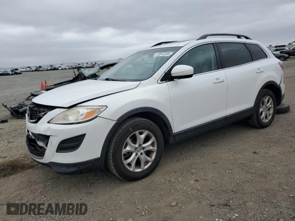 2012 Mazda CX-9 Touring with VIN JM3TB3CV3C0336043, listed as a Copart auction lot 59914335 with 106,595 mi miles and Salvage title. Bid and sale history available at DreamBid. Image 1.