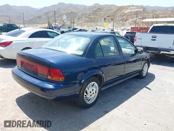1998 Saturn SL z VIN 1G8ZK5270WZ174447, wystawiony jako IAAI lot #42543578 z przebiegiem 137 326 mil mil oraz . Historia ofert i sprzedaży dostępna na DreamBid. Obrazek 4.