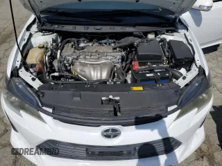 2014 Scion tC z VIN JTKJF5C71E3082375, wystawiony jako Copart lot #56909095 z przebiegiem 140 165 mil mil oraz Szkoda całkowita • Salvage title. Historia ofert i sprzedaży dostępna na DreamBid. Obrazek 11.