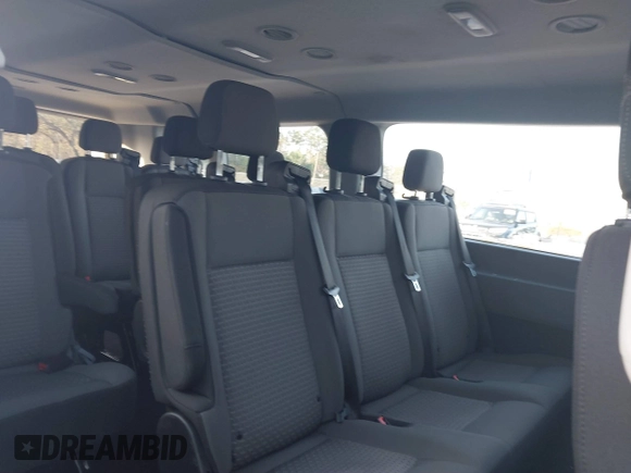 2023 Ford Transit Passenger XL with VIN 1FBAX2Y8XPKB33065, listed as a IAAI auction lot 41440531 with 21,155 mi miles and . Bid and sale history available at DreamBid. Image 8.