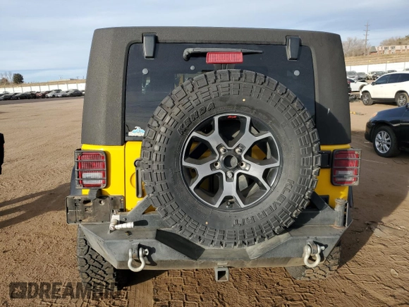 2009 Jeep Wrangler Rubicon with VIN 1J4GA64109L707008, listed as a Copart auction lot 87492674 with 157,104 mi miles and Salvage Title. Bid and sale history available at DreamBid. Image 6.