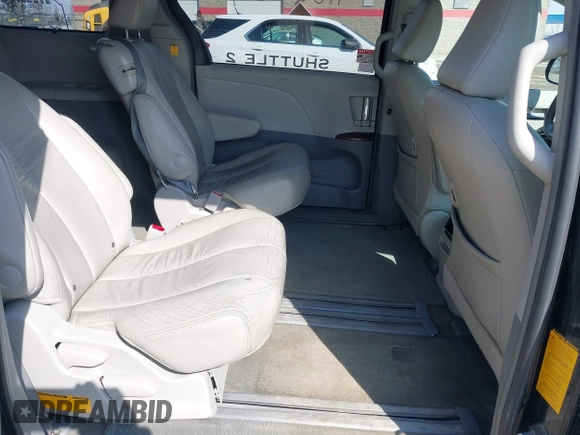 2012 Toyota Sienna XLE AAS z VIN 5TDYK3DC5CS186980, wystawiony jako IAAI lot #41680554 z przebiegiem 330 023 mil mil oraz . Historia ofert i sprzedaży dostępna na DreamBid. Obrazek 8.