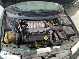 1999 Chrysler Cirrus LXi z VIN 1C3EJ56H6XN600228, wystawiony jako Copart lot #86002314 z przebiegiem 42 402 mil mil oraz Tytuł czysty. Historia ofert i sprzedaży dostępna na DreamBid. Obrazek 11.