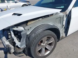 2015 Dodge Challenger SXT with VIN 2C3CDZAG4FH739754, listed as a IAAI auction lot 42028773 with 150,001 mi miles. Bid and sale history available at carsss.com. Image 6.