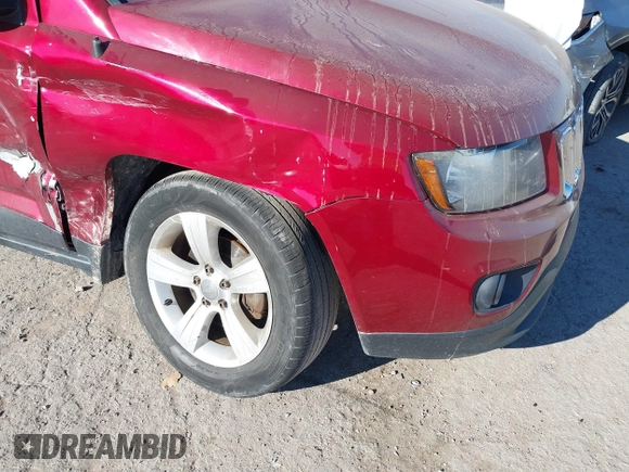 2016 Jeep Compass Latitude with VIN 1C4NJDEB1GD662807, listed as a IAAI auction lot 41161996 with 128,030 mi miles. Bid and sale history available at carsss.com. Image 6.