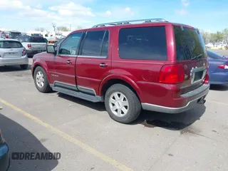 2004 Lincoln Navigator Luxury with VIN 5LMFU28R14LJ15068, listed as a IAAI auction lot 42078597 with 150,294 mi miles. Bid and sale history available at carsss.com. Image 3.