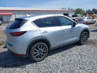 2018 Mazda CX-5 Grand Touring z VIN JM3KFADM7J0318684, wystawiony jako IAAI lot #42226937 z przebiegiem 69 166 mil mil oraz . Historia ofert i sprzedaży dostępna na DreamBid. Obrazek 4.