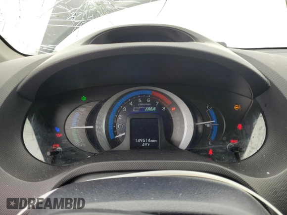 2010 Honda Insight LX with VIN JHMZE2H56AS022299, listed as a Copart auction lot 54872215 with 149,514 mi miles and Salvage title. Bid and sale history available at DreamBid. Image 9.